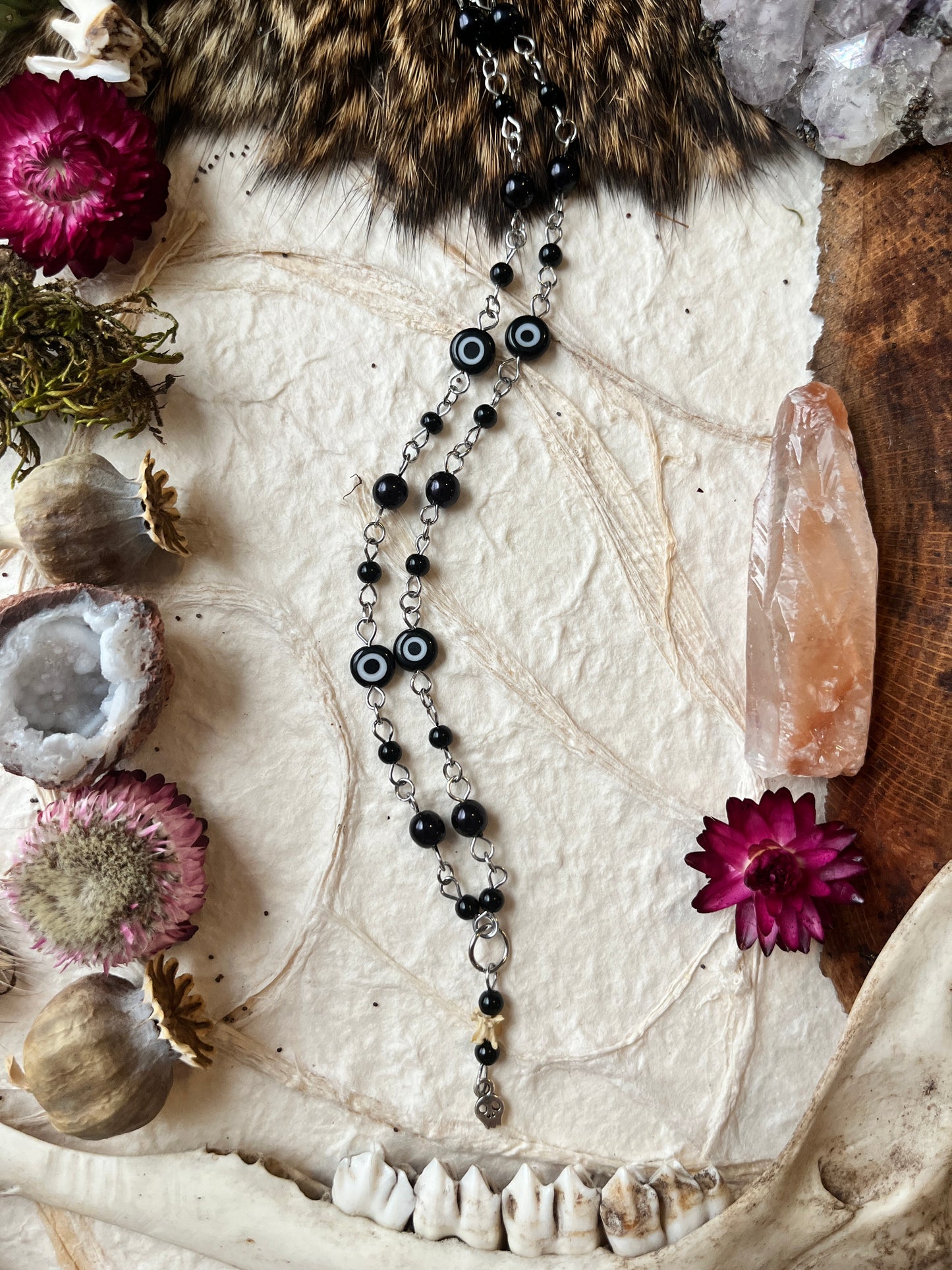 Evil Eye with Skull Charm Snake Vertebra Necklace