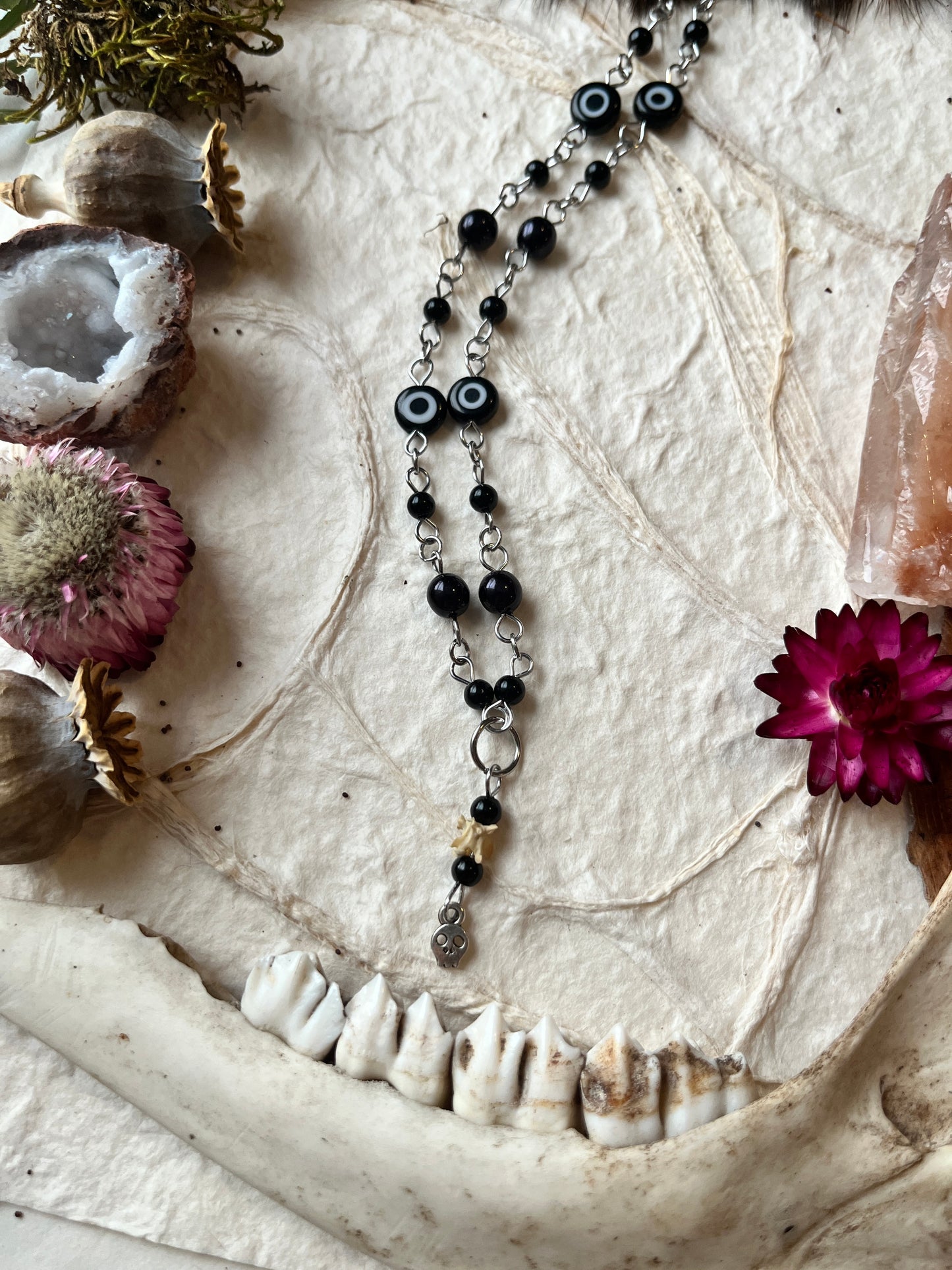 Evil Eye with Skull Charm Snake Vertebra Necklace